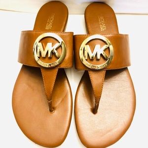 Michael Kors leather sandals with gold metal “MK”